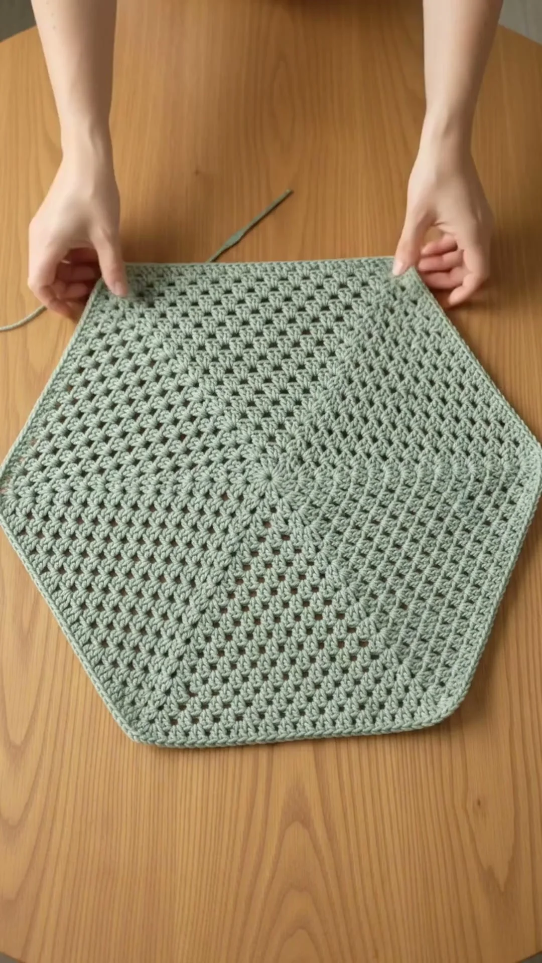 Cozy crochet hexagon cardigan for layering in stylish design.